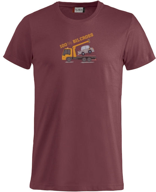 En blå t-skjorte med bilde av en redningsbil trykket på fremsiden